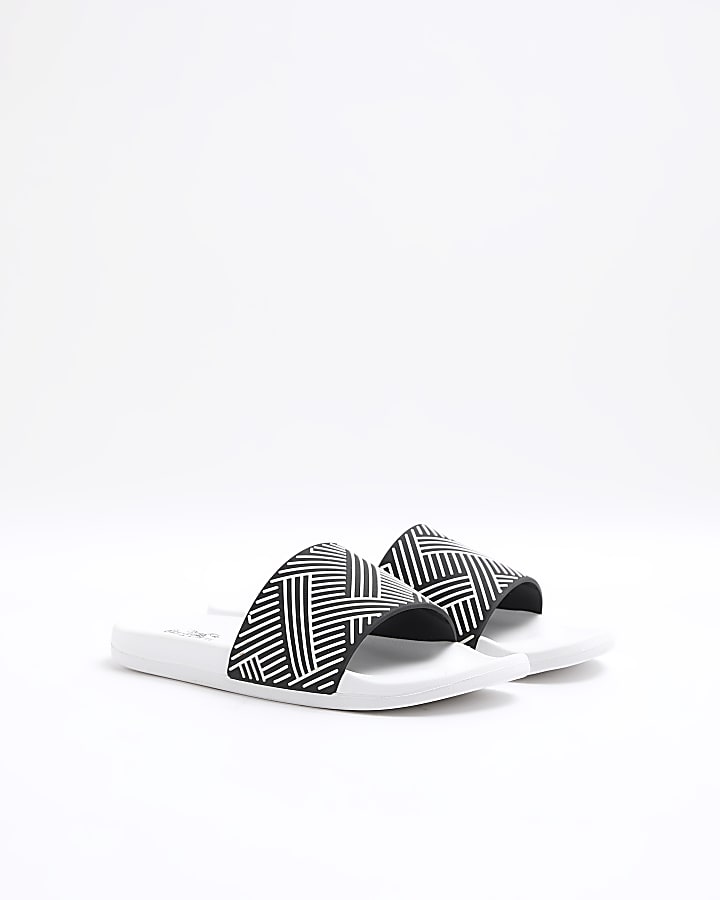 White embossed geometric sliders