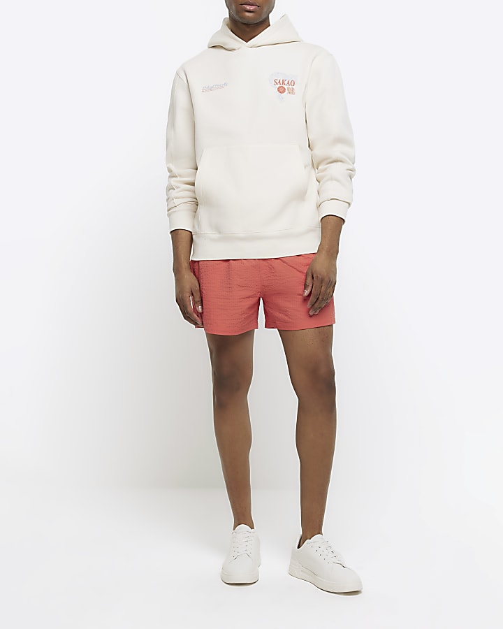 Pink regular fit seersucker swim shorts