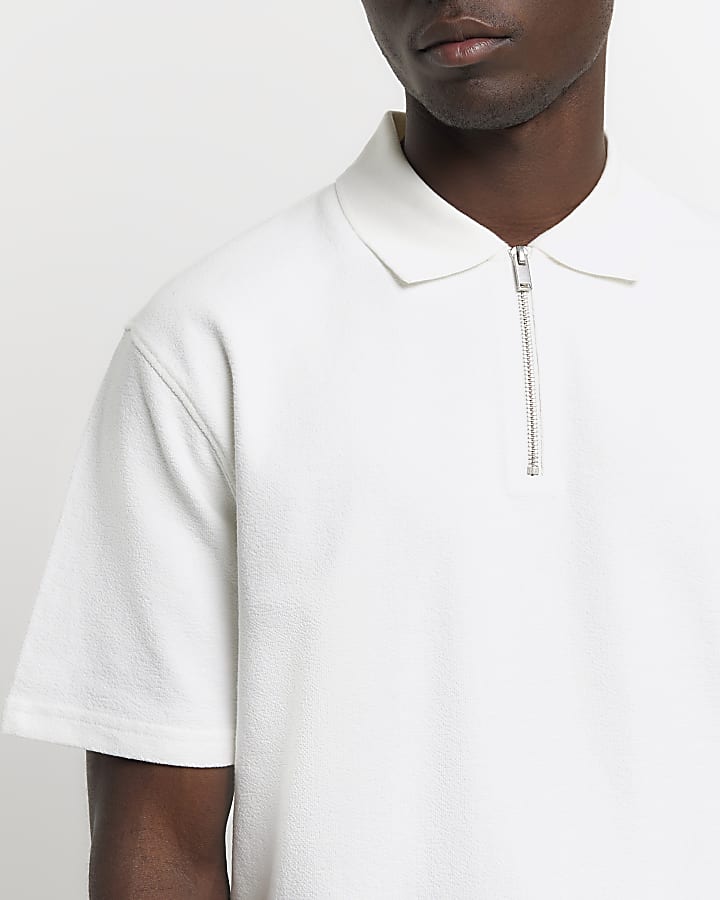 Beige regular fit textured half zip polo