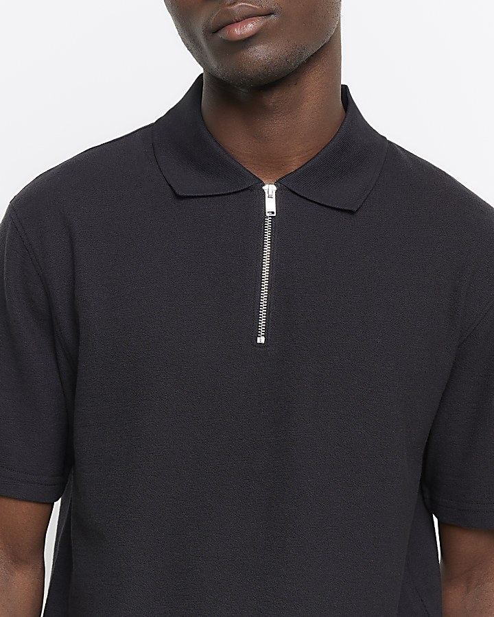 Black regular fit textured half zip polo