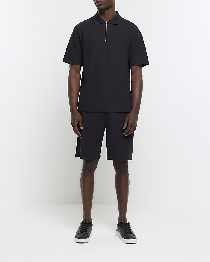 Black regular fit textured half zip polo