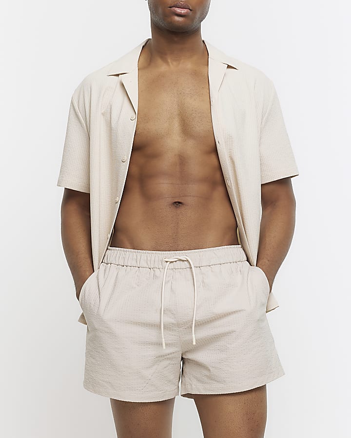 Stone regular fit seersucker swim shorts River Island