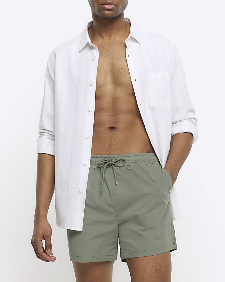 Swim shorts river island online