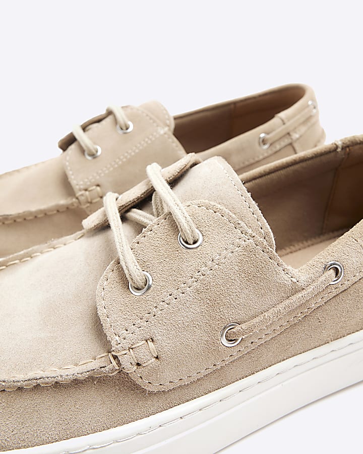 Beige suede boat shoes