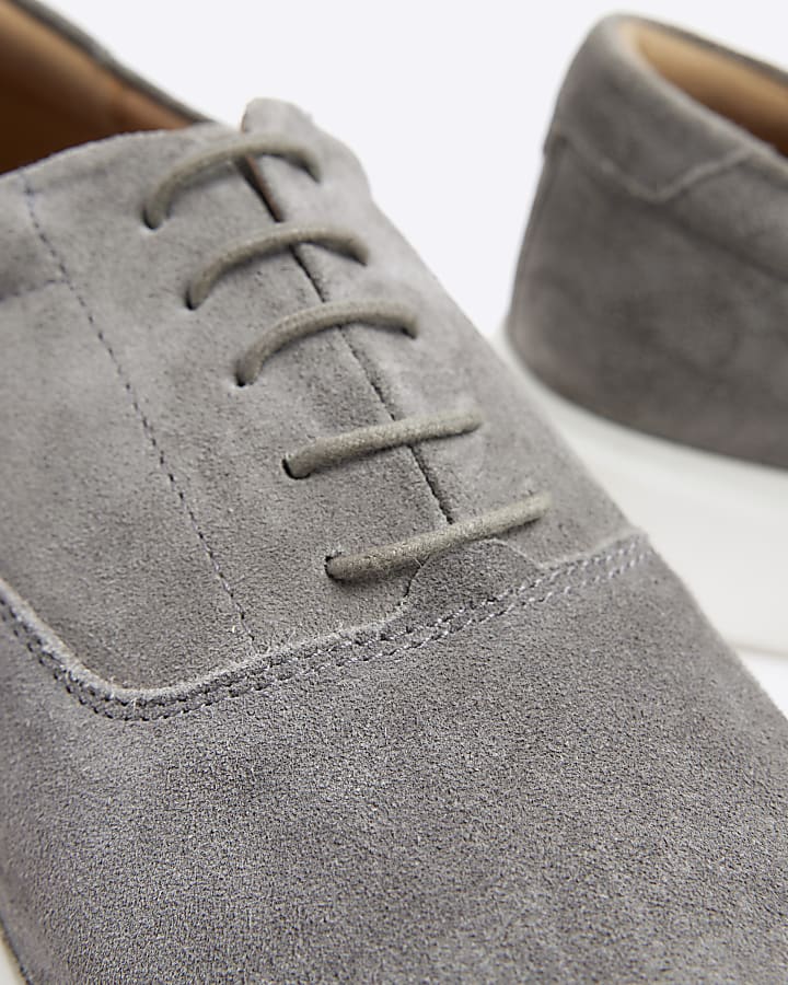 Grey suede lace up trainers