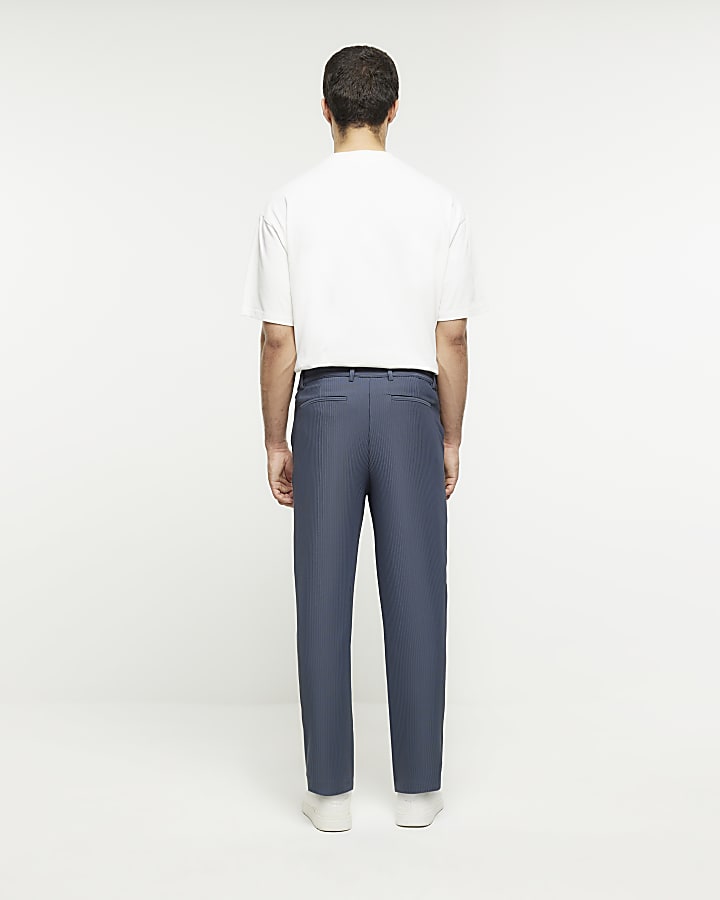 Blue tapered fit plisse smart trousers