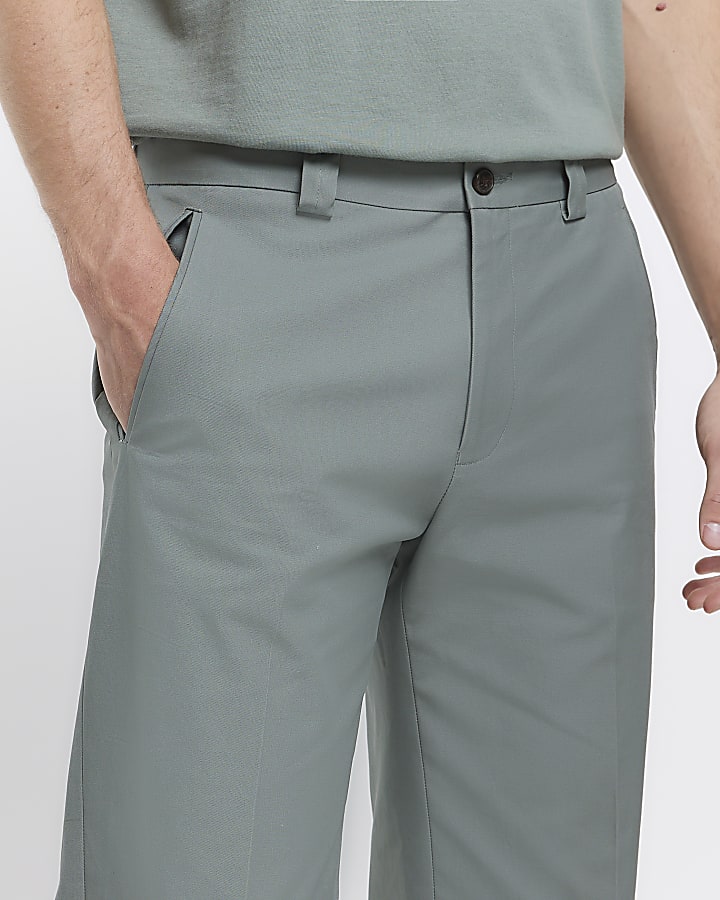 Green tapered fit smart trousers
