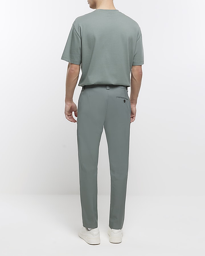 Green tapered fit smart trousers