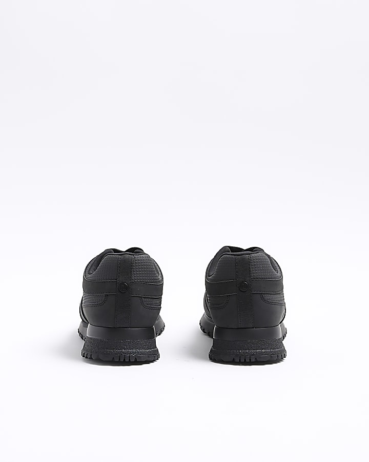 Black embossed trainers