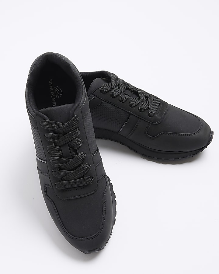 Black embossed trainers