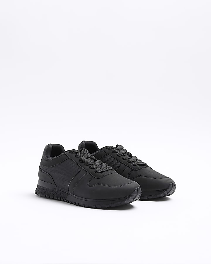 Black embossed trainers