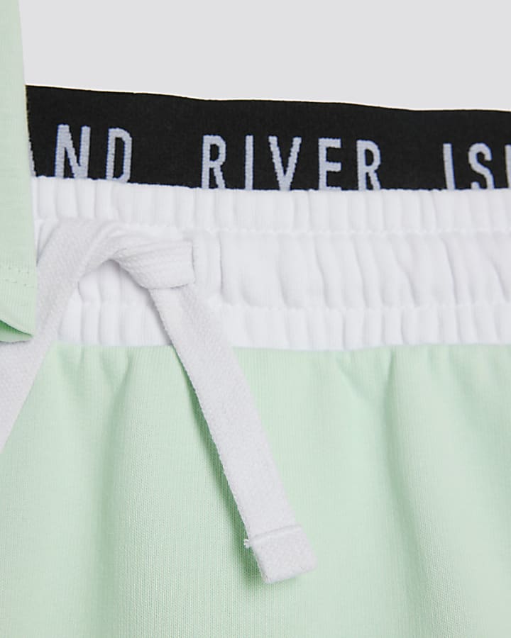 Girls Green Top And Runner Skirt Set