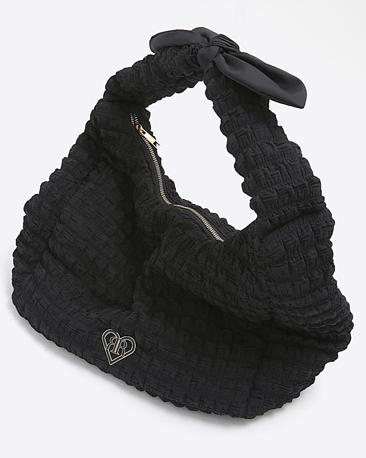 Girls black textured bow shopper bag