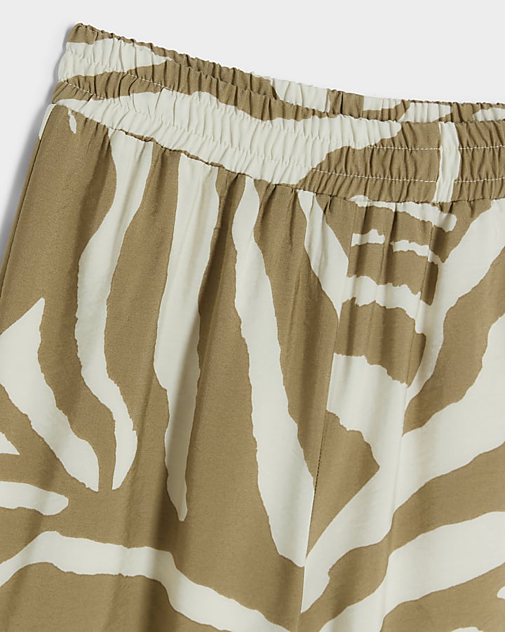 Girls beige zebra print wide leg trousers