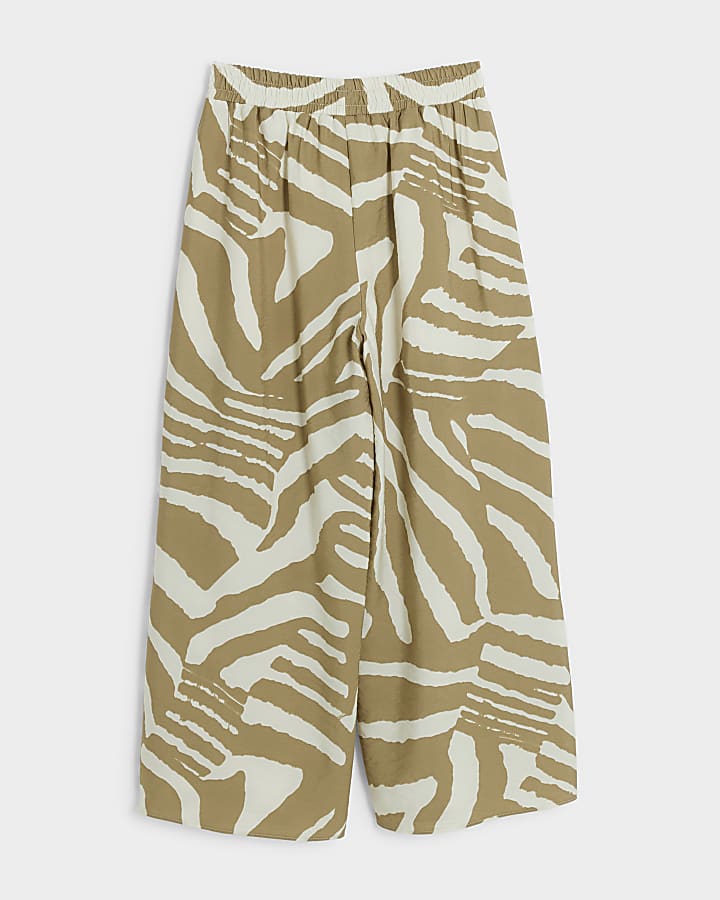 Girls beige zebra print wide leg trousers