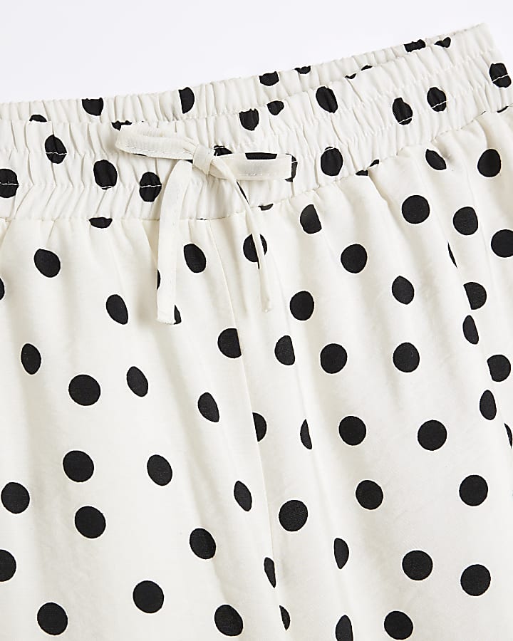 Girls white polka dot wide leg trousers