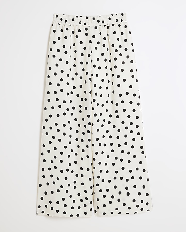 Girls white polka dot wide leg trousers