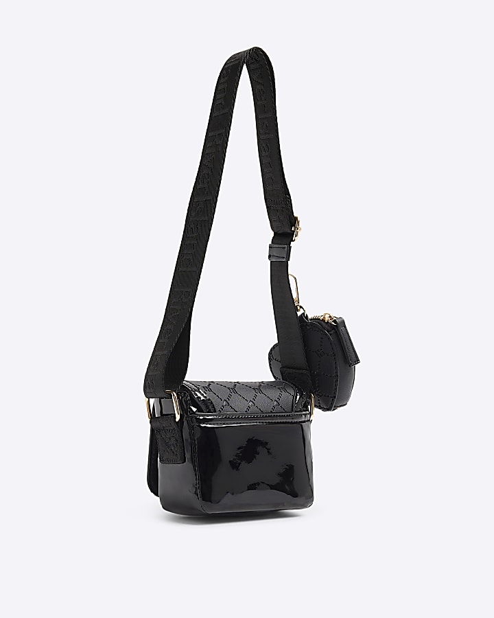 Girls black embossed monogram bow bag