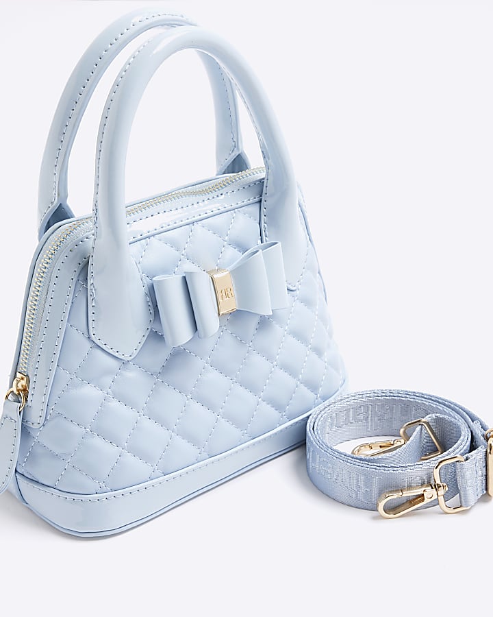 Girls blue quilted bow cross body bag