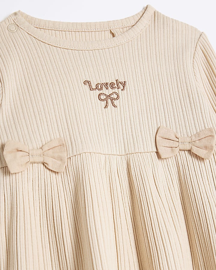 Baby girl beige ribbed bow peplum set