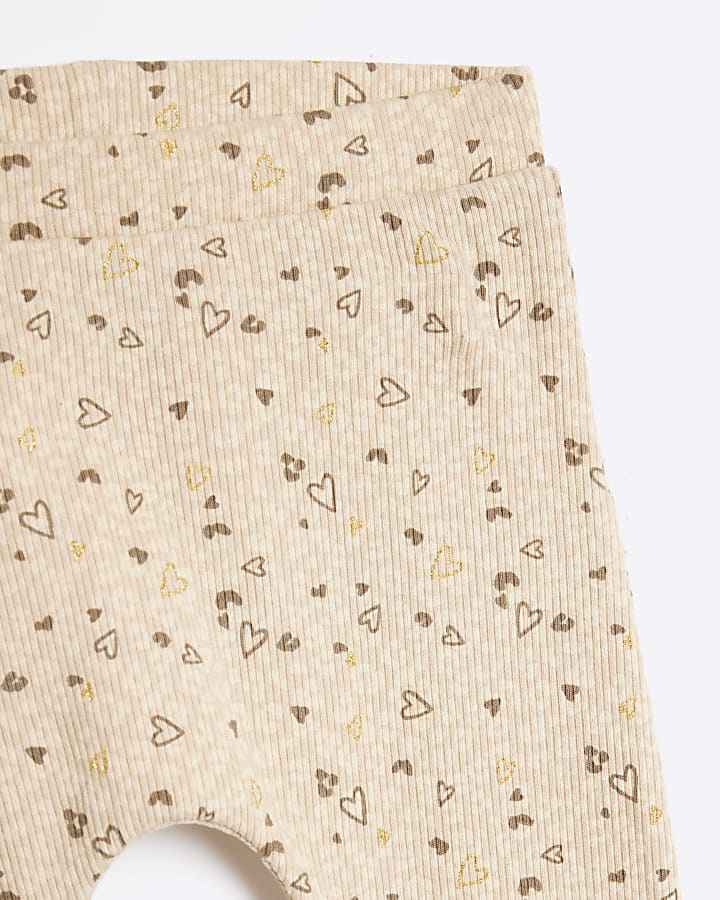 Baby girl beige ribbed bow peplum set