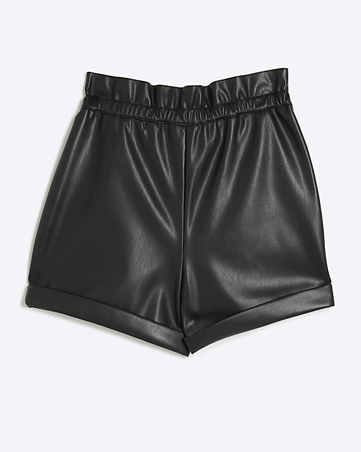 Girls black faux leather belted shorts
