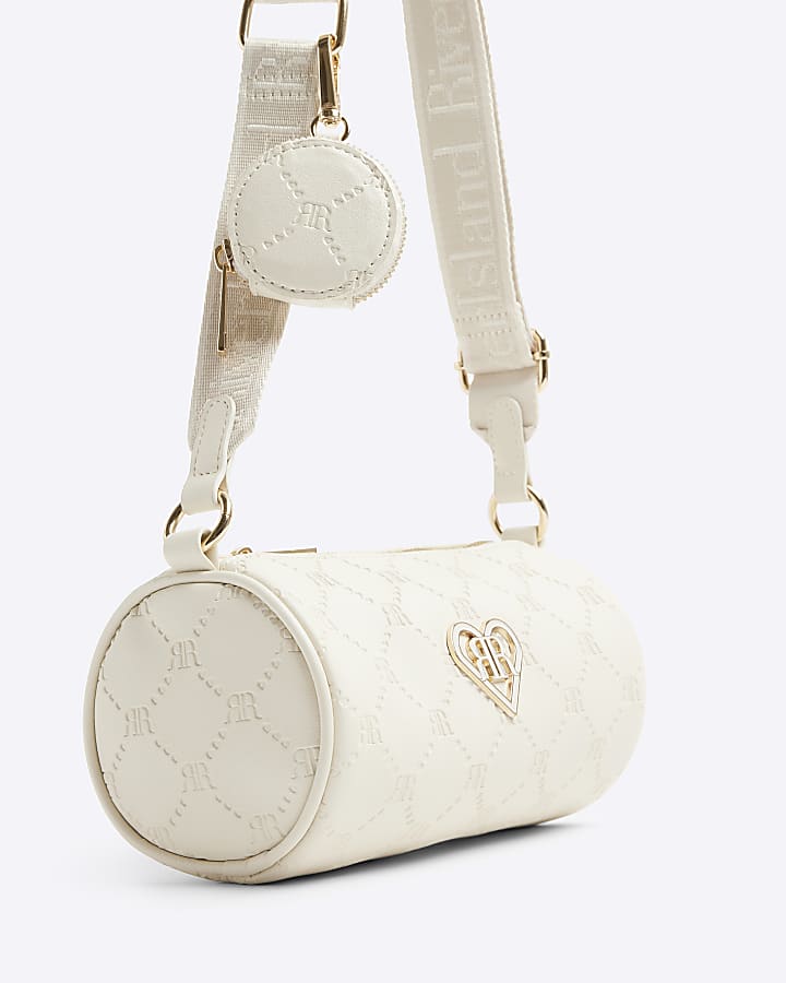 Girls cream RI embossed barrel cross body bag