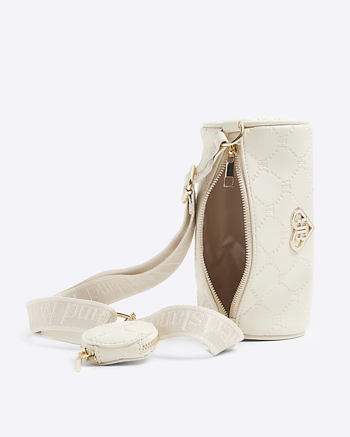Girls cream RI embossed barrel cross body bag