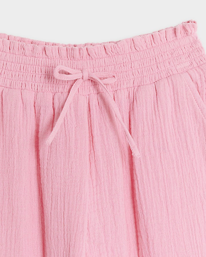 Girls pink textured wide leg trousers