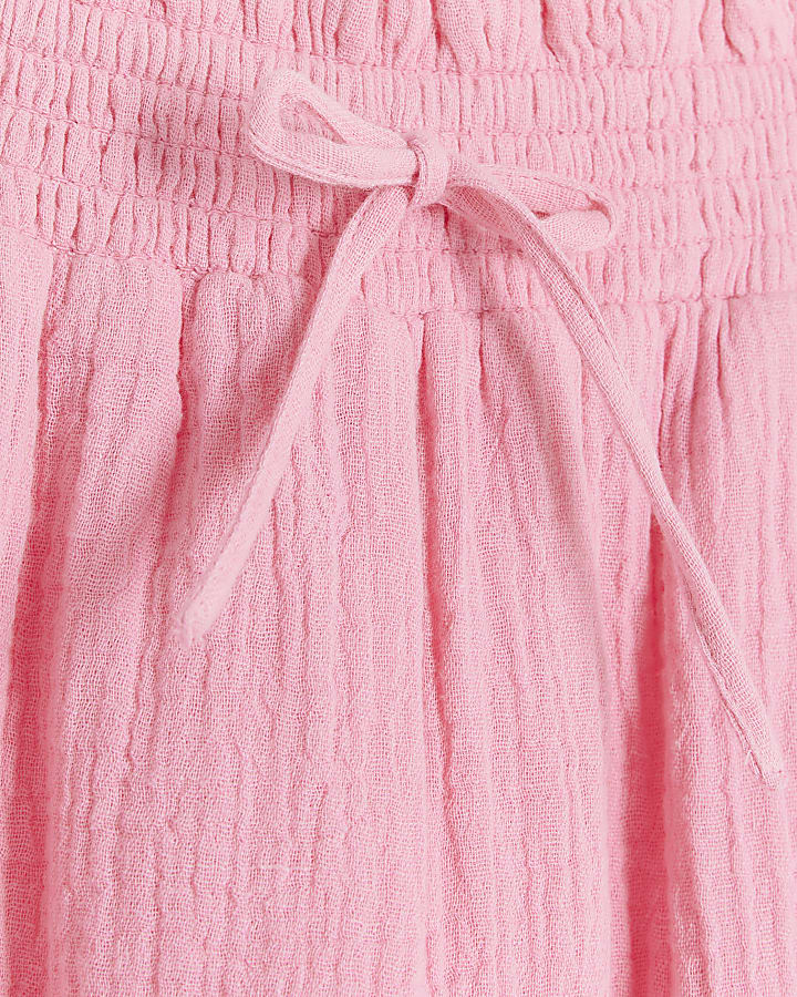 Girls pink textured wide leg trousers