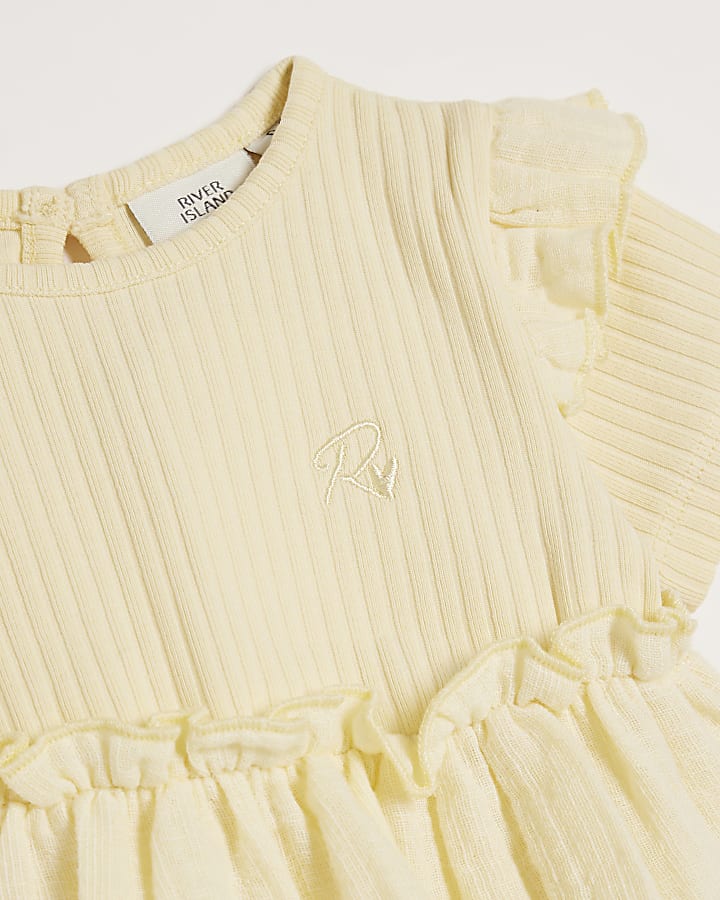 Baby girls yellow ribbed peplum top set