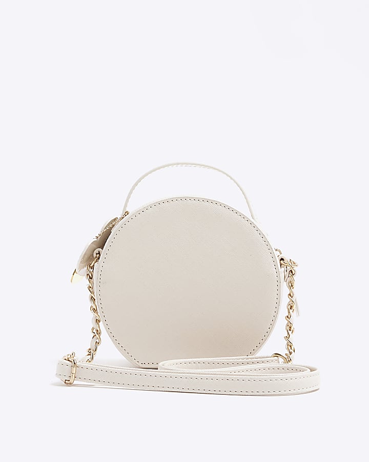 Girls cream embossed circle cross body bag