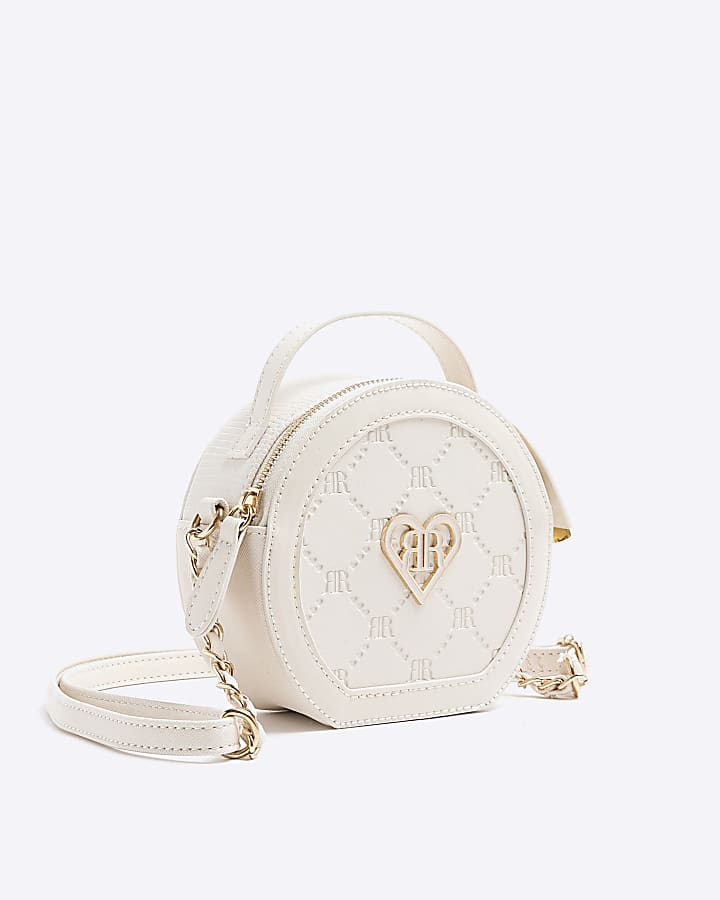 Girls cream embossed circle cross body bag