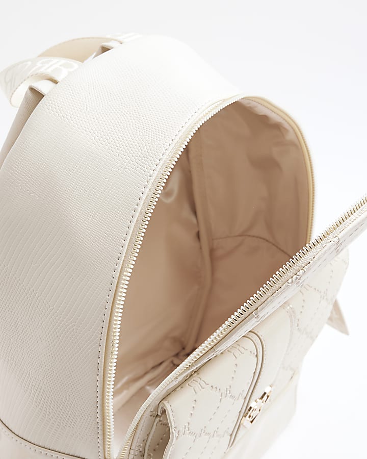 Girls cream embossed monogram backpack