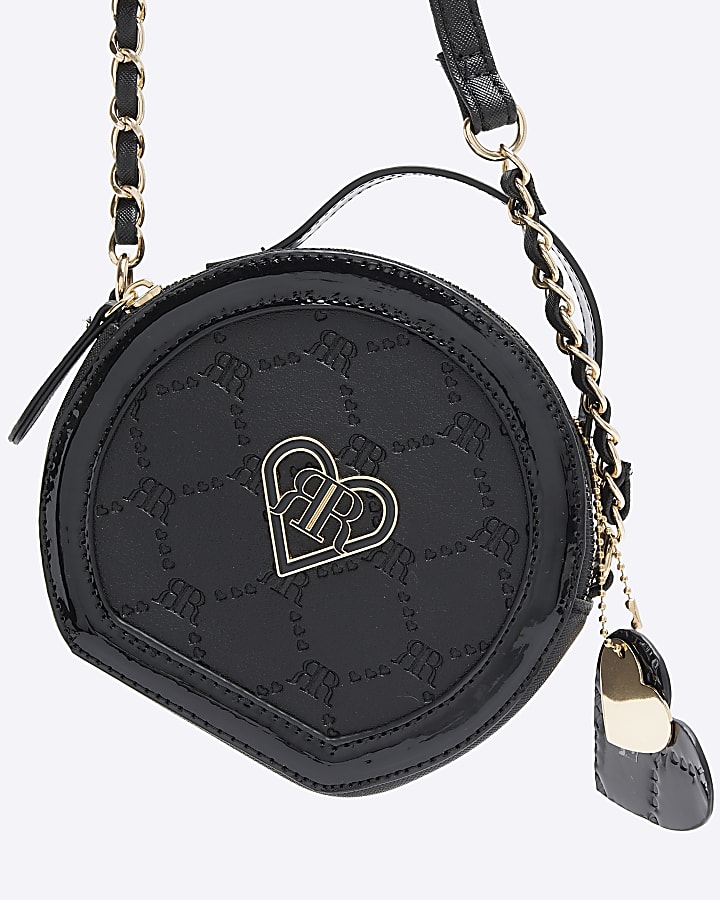 Girls black circle embossed cross body bag