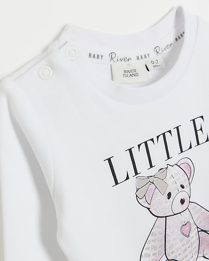 Baby girls white bear graphic all in one