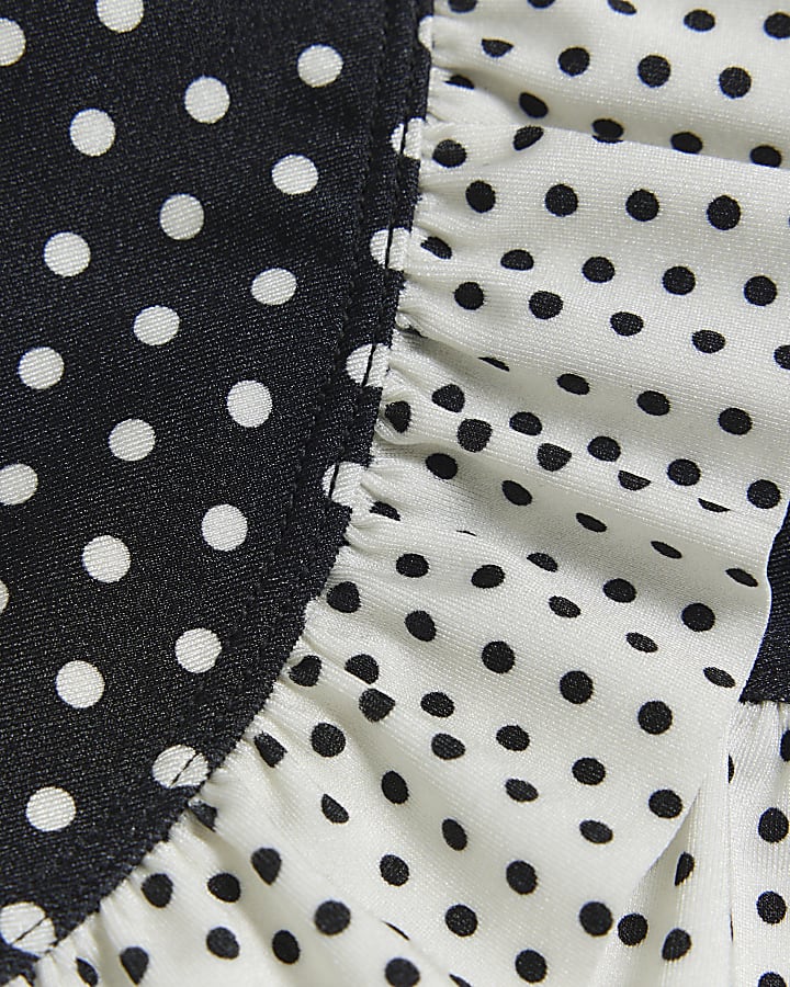 Mini girls black polka dot swim skirt