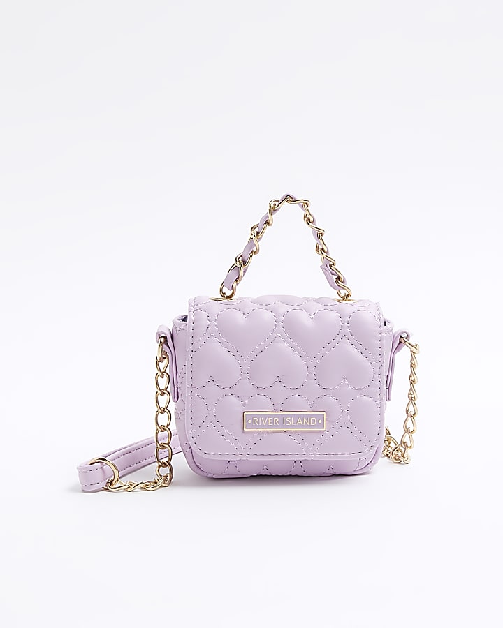 Pink quilted heart cross body bag River Island