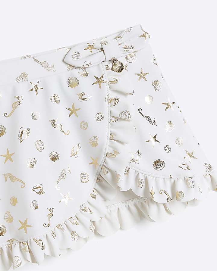 Mini girls cream shell wrap swim skirt