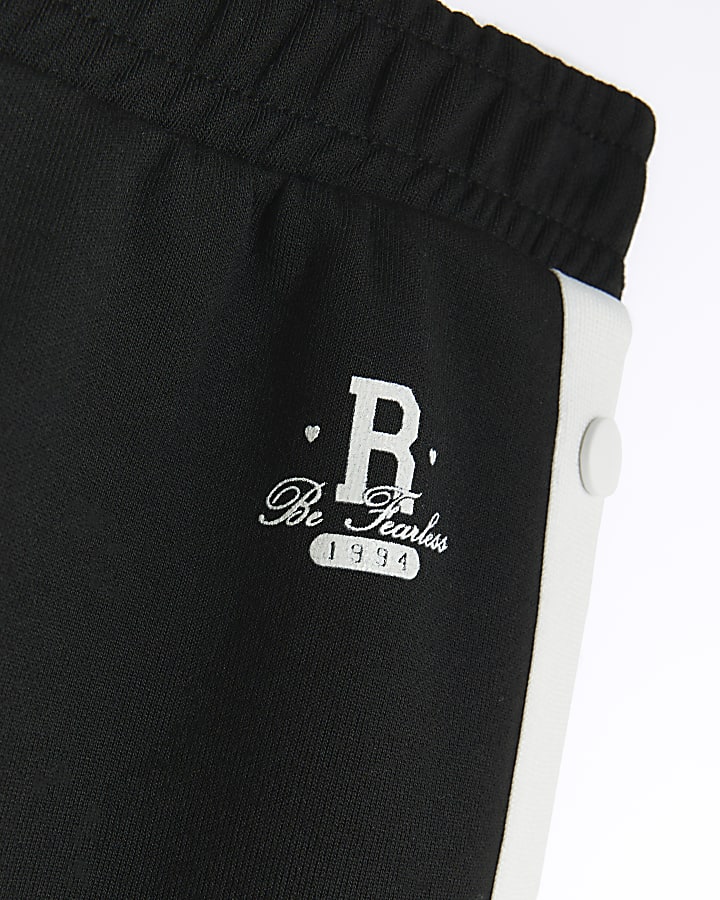 Girls black side popper joggers