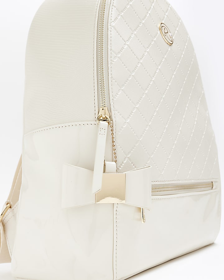 Girls cream quilted bow detail backpack