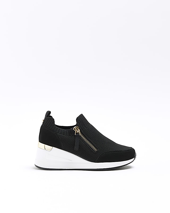 Girls black wedge trainers