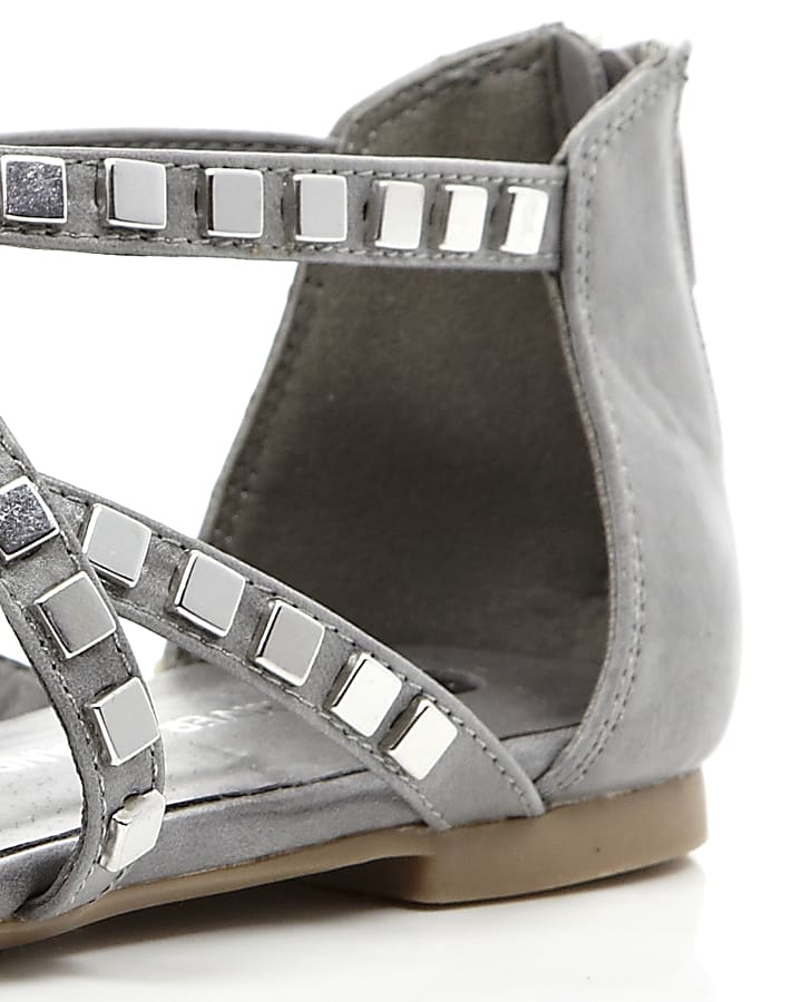 Grey studded metal gladiator sandals