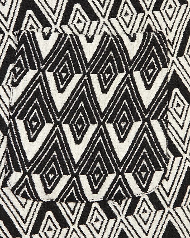 Black and white printed pinafore dress