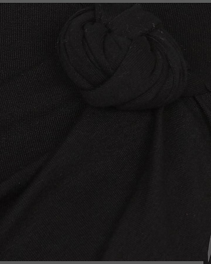 Black Rihanna knot front thigh split skirt
