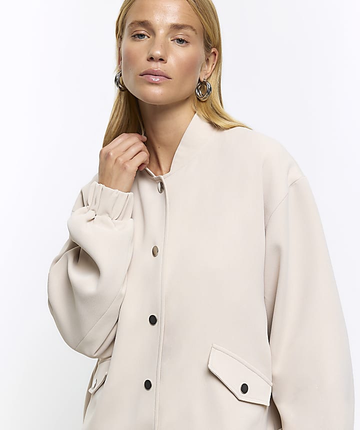 Beige oversized bomber jacket