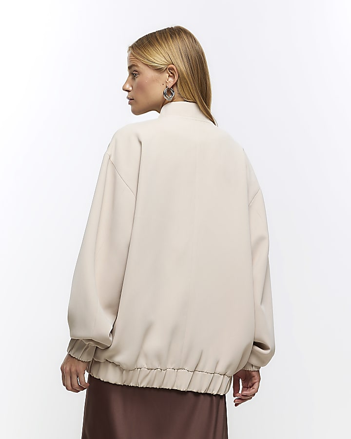 Beige oversized bomber jacket