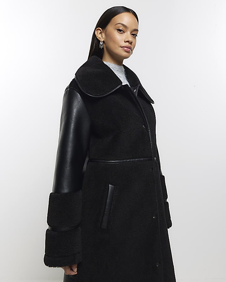 Black longline shearling coat