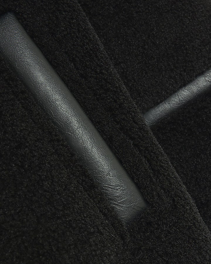 Black longline shearling coat