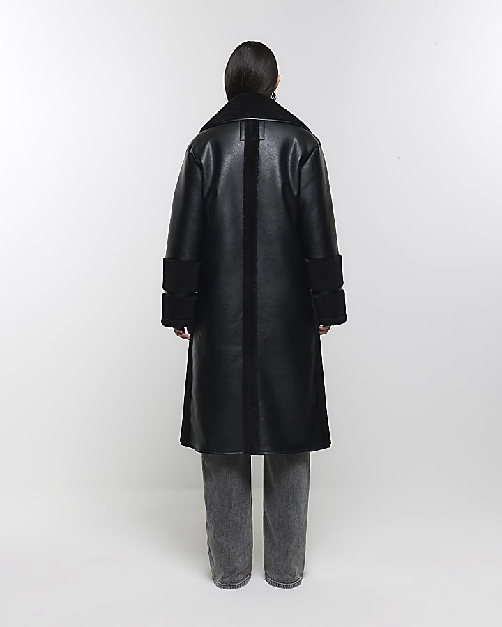 Black longline shearling coat